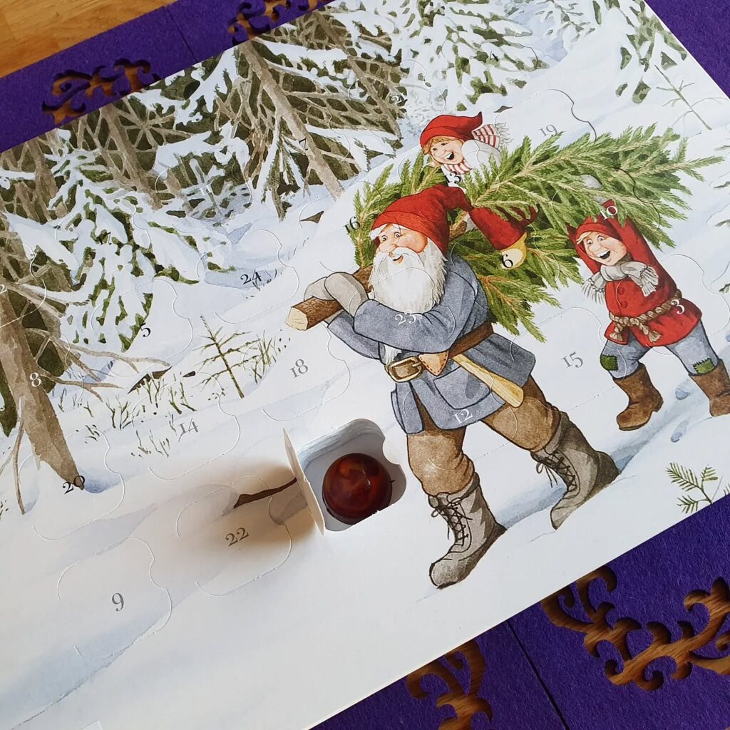 Adventskalender fra Nittedal Sjokoladefabrikk med vinterlandskap